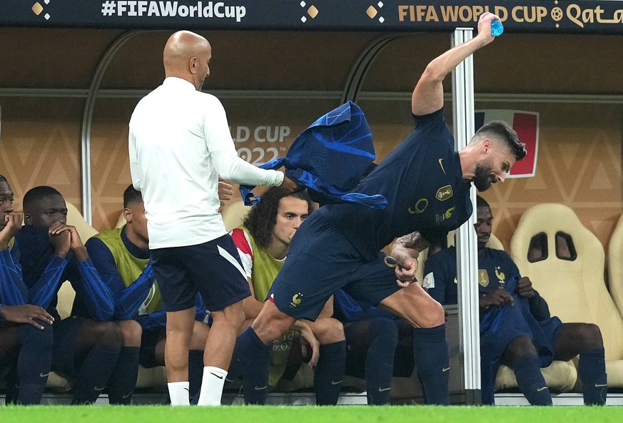 Argentina v France - FIFA World Cup, WM, Weltmeisterschaft, Fussball 2022 - Final - Lusail Stadium France s Olivier Giroud reacts by throwing a bottle onto the floor after being substituted off during ...