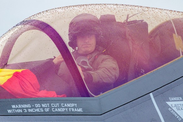 epa12451248 F-35 Pilot Commander of the Belgian F-35 Squadron Tanguy 'Cortex' Five arrives in one of the first Lockheed Martin F-35A Lightning II fighter jets delivered to the Belgian Air an ...