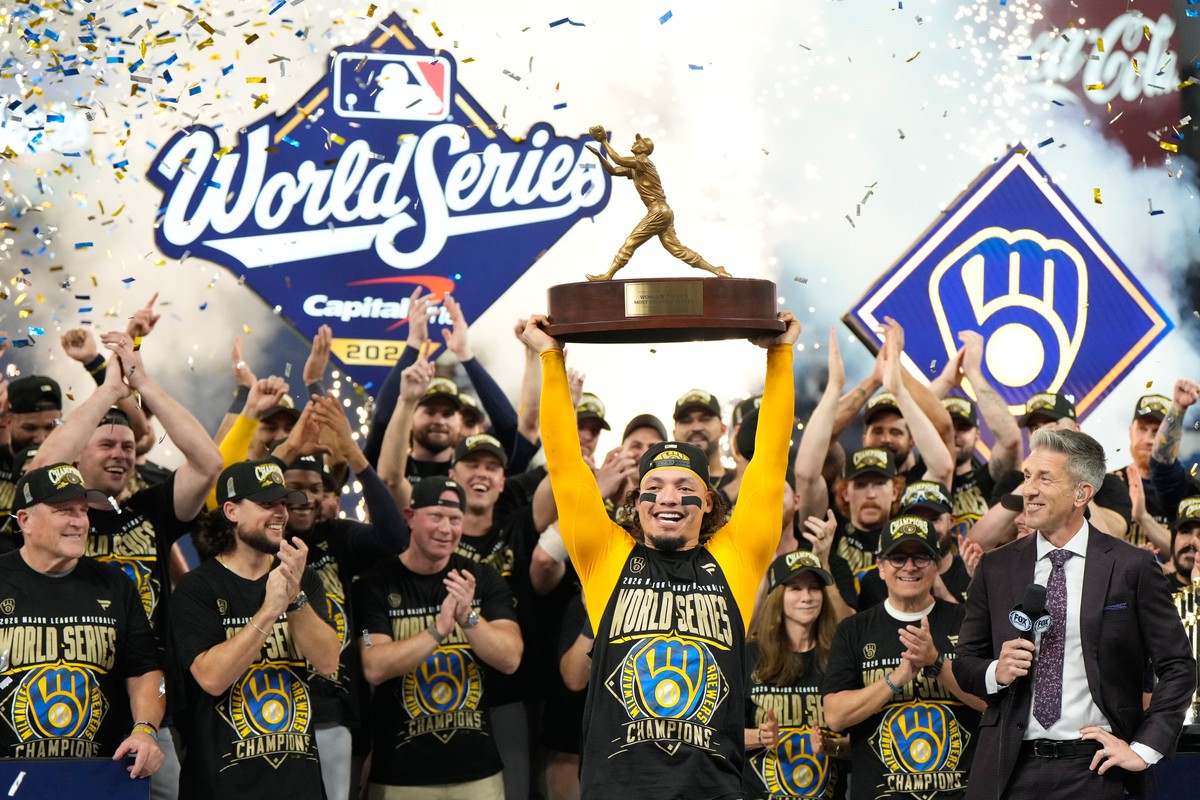 Milwaukee Brewers catcher William Contreras holds the MVP trophy after they won baseball's World Series against the Tampa Bay Rays, Wednesday, Oct. 28, 2026, in St. Petersburg, Fla. (AP Photo/Ash ...