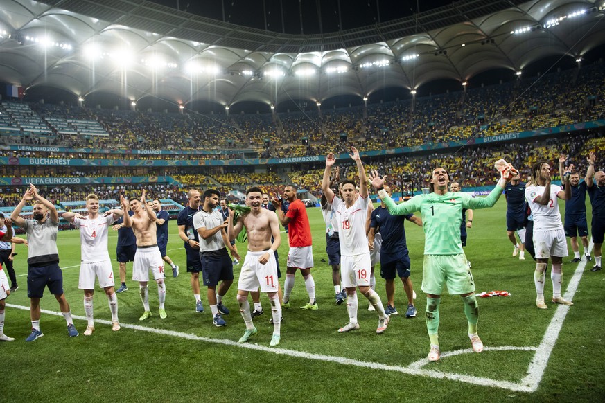 Players of Switzerland celebrate after winning the UEFA EURO 2020 round of 16 soccer match between France and Switzerland at the National Arena stadium, in Bucharest, Romania, Monday, June 28, 2021. ( ...