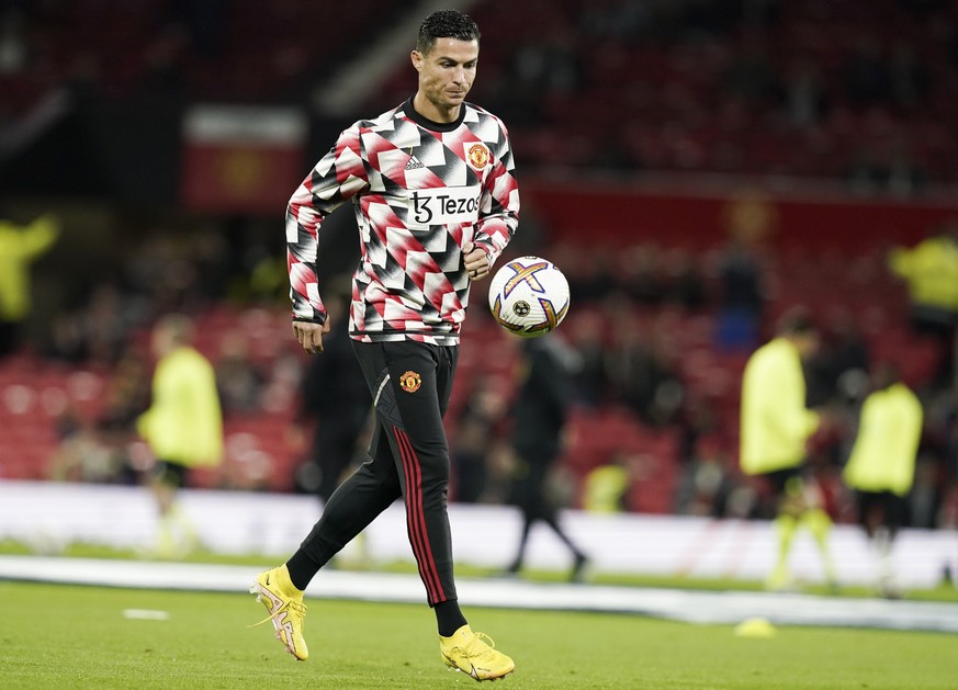 epa10253102 Cristano Ronaldo of Manchester United warms up prior to the English Premier League soccer match between Manchester United and Tottenham Hotspur in Manchester, Britain, 19 October 2022. EPA ...