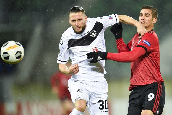 Lugano&#039;s Fabio Daprela, left, versus Copenhagen&#039;s Pieros Sotiriou, during the UEFA Europa League Group B match between Switzerland&#039;s FC Lugano and Denmarks&#039; FC Copenhagen, on Thurs ...