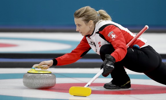 Switzerland&#039;s skip Silvana Tirinzoni throws a stone during a women&#039;s curling match against United States at the 2018 Winter Olympics in Gangneung, South Korea, Thursday, Feb. 15, 2018. (AP P ...