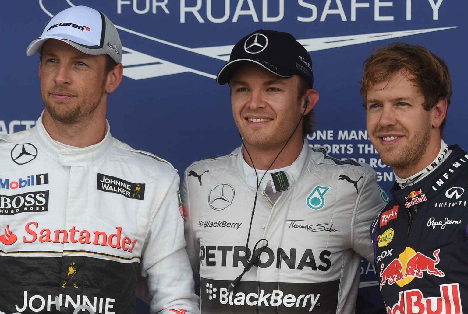 V. l. n. r.: Button (3.), Rosberg (1.), Vettel. (2.)