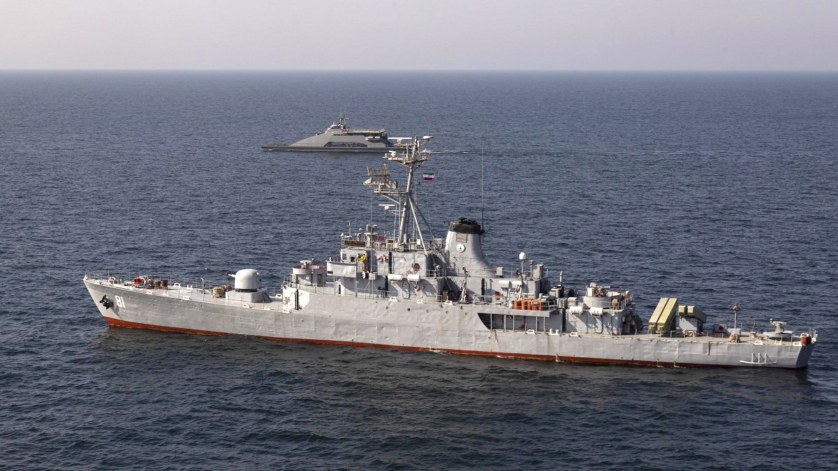 epa10528050 A handout photo made available by Iranian Army shows Corvette Bayandor (front) of the Islamic Republic of Iran Navy during a joint military drill of Iranian, Russian and Chinese warships i ...