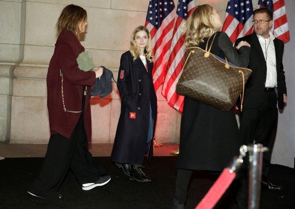 Jackie Evancho (C), who will sing the national anthem during the inauguration, arrives to attend a candlelight dinner with President-elect Donald Trump at Union Station in Washington, U.S., January 19 ...