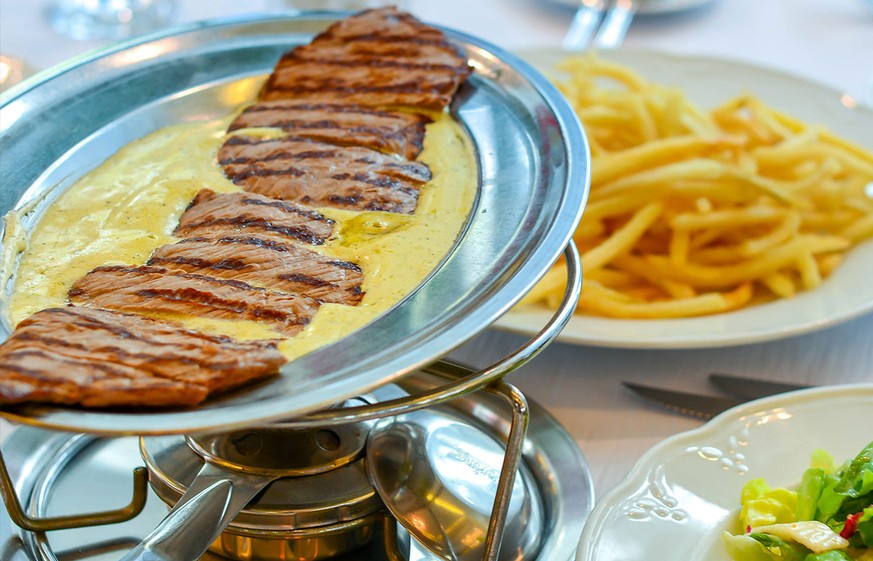 entrecote cafe de paris geneve genf steak rindfleisch pommes frites schweiz frankreich essen food fleisch http://www.g-hospitality.com/img/home3/home3_bg2.jpg