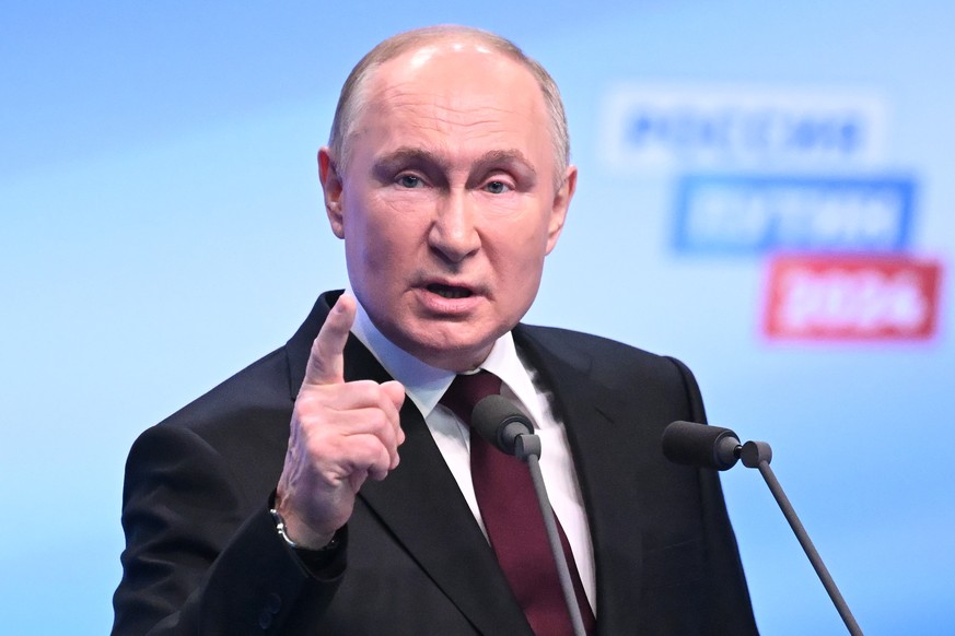 epa11226963 Russian President and presidential candidate Vladimir Putin meets with the media at his campaign headquarters in Moscow, Russia, 18 March 2024. Based on the results of processing more than ...