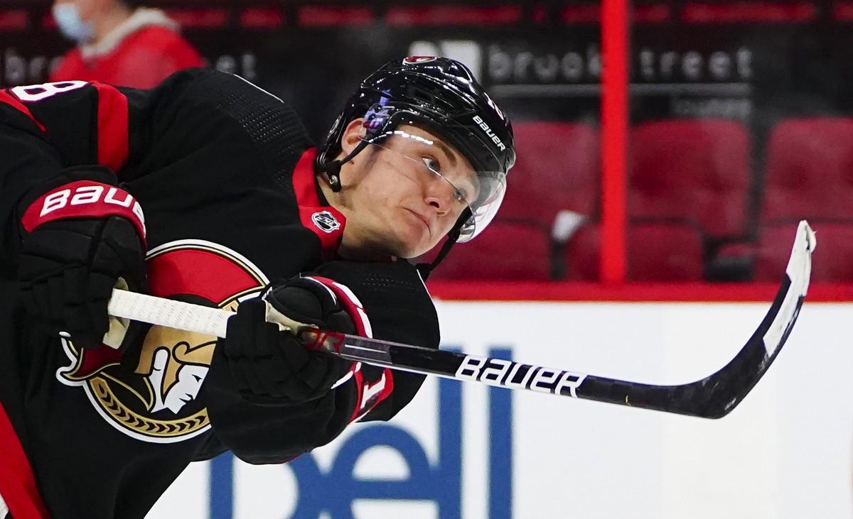Ottawa Senators' Tim Stutzle (18) warms up prior to taking on the Toronto Maple Leafs in preseason NHL hockey game action in Ottawa, Ontario, Monday, Oct. 4, 2021. (Sean Kilpatrick/The Canadian P ...