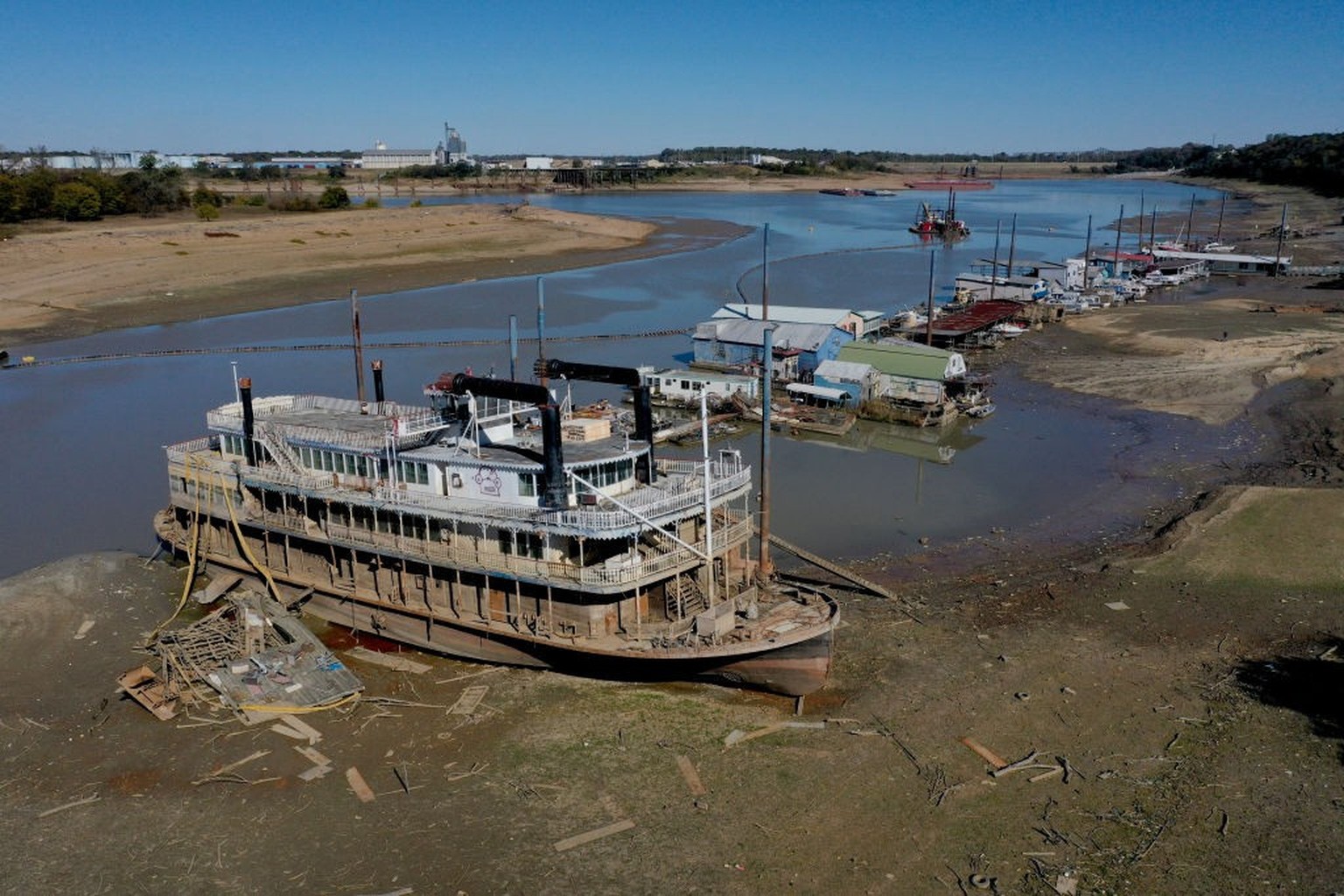 MEMPHIS, TENNESSEE - OCTOBER 19: The Diamond Lady, a once majestic riverboat, rests with smaller boats in mud at Riverside Park Marina in Martin Luther King Jr. Riverside Park along the Mississippi Ri ...