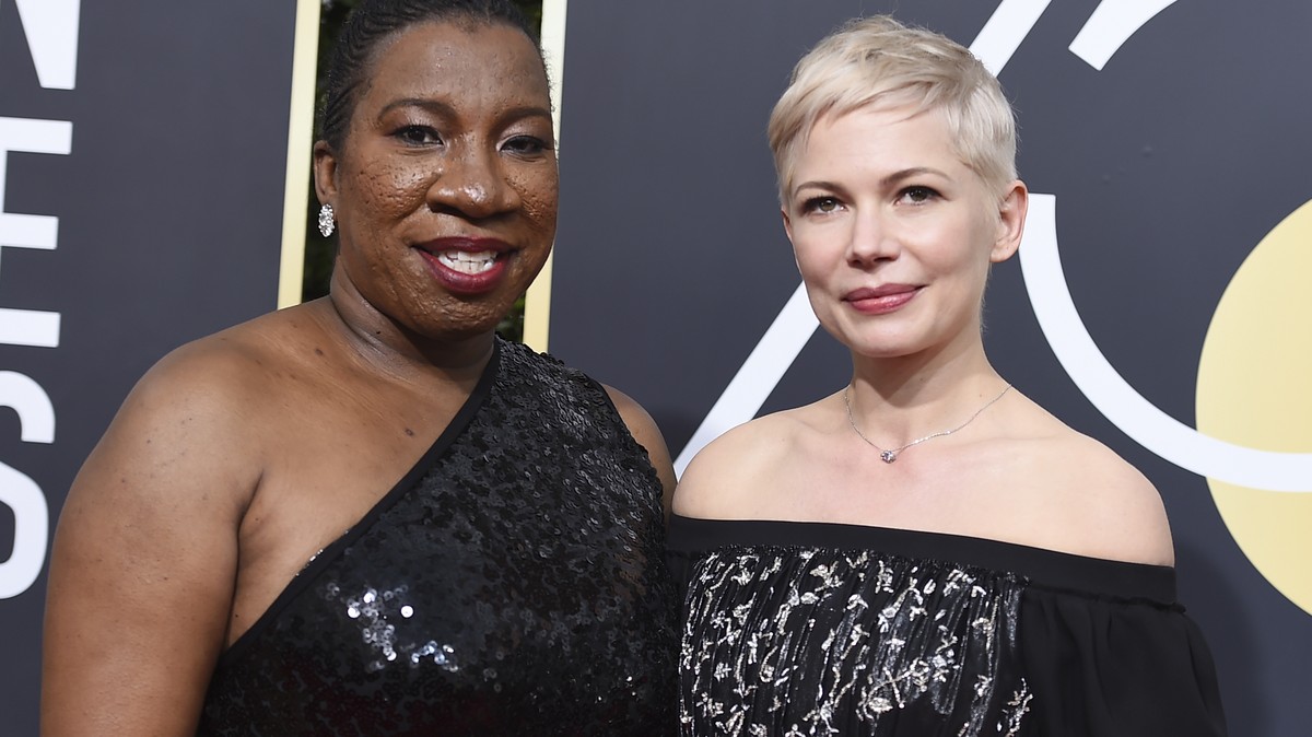 Tarana Burke, left, and Michelle Williams arrive at the 75th annual Golden Globe Awards at the Beverly Hilton Hotel on Sunday, Jan. 7, 2018, in Beverly Hills, Calif. (Photo by Jordan Strauss/Invision/ ...