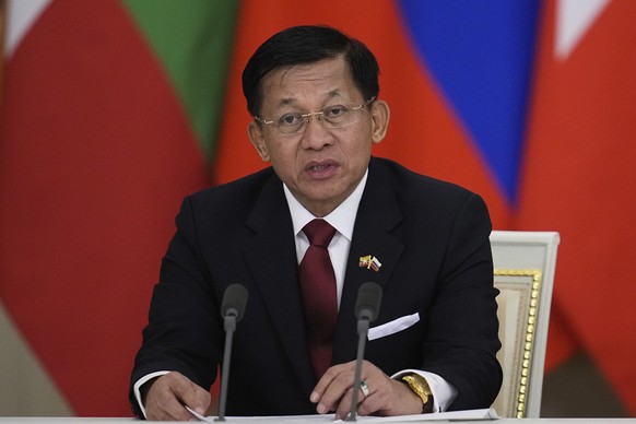 Myanmar&#039;s Military leader Senior Gen. Min Aung Hlaing speaks during a joint news conference with Russian President Vladimir Putin following their meeting at the Grand Kremlin Palace in Moscow, Ru ...