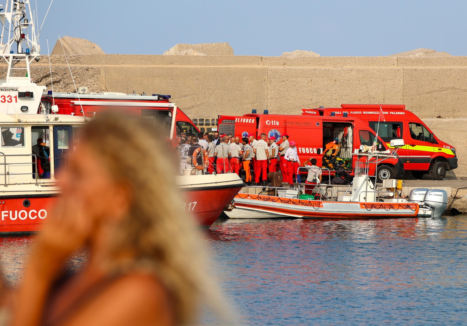 epa11555178 Experienced cave divers for deep sea recoveries arrive at the pier as a rescue operation continues for the missing people who were on board a sailboat that sank, in Palermo, Sicily, Italy, ...