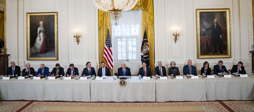 epa12639393 US President Donald Trump (C) speaks during a meeting with oil and gas executives in the East Room of the White House in Washington, DC, USA, 09 January 2026. The meeting included executiv ...