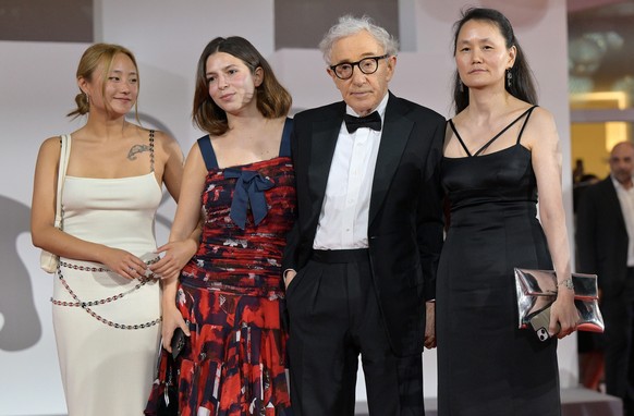epa10840746 (L-R) Bechet Allen, Manzie Tio Allen, US filmmaker Woody Allen, and his wife Soon-Yi Previn arrive for the screening of his movie &#039;Coup de Chance&#039; during the 80th annual Venice I ...