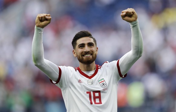 Iran&#039;s Alireza Jahanbakhsh celebrates his team&#039;s victory after the group B match between Morocco and Iran at the 2018 soccer World Cup in the St. Petersburg Stadium in St. Petersburg, Russia ...