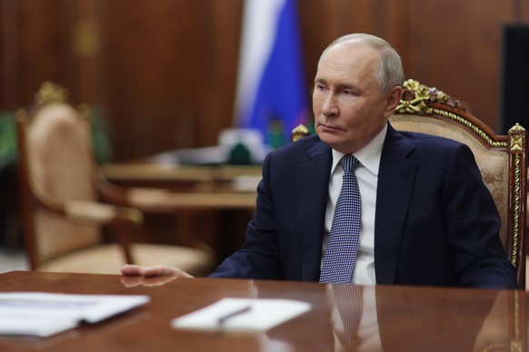 epa11834472 Russian President Vladimir Putin looks on during his meeting with the President of the National Medical Research Centre for Endocrinology Ivan Dedov(not pictured) in Moscow, Russia, 18 Jan ...
