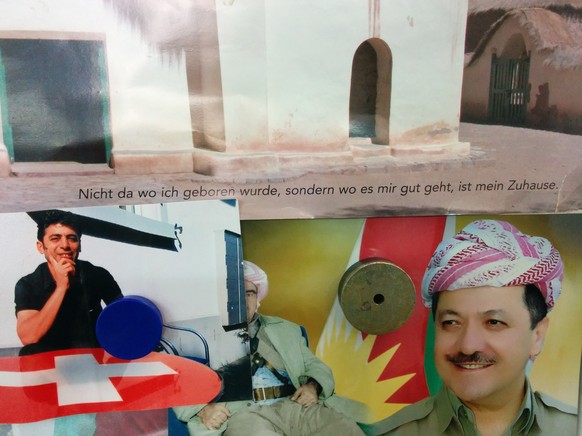 Weisheit hinter der Kasse über einem Bild von&nbsp;Massud Barsani, Präsident der Autonomen Region Kurdistan im Nordirak.&nbsp;