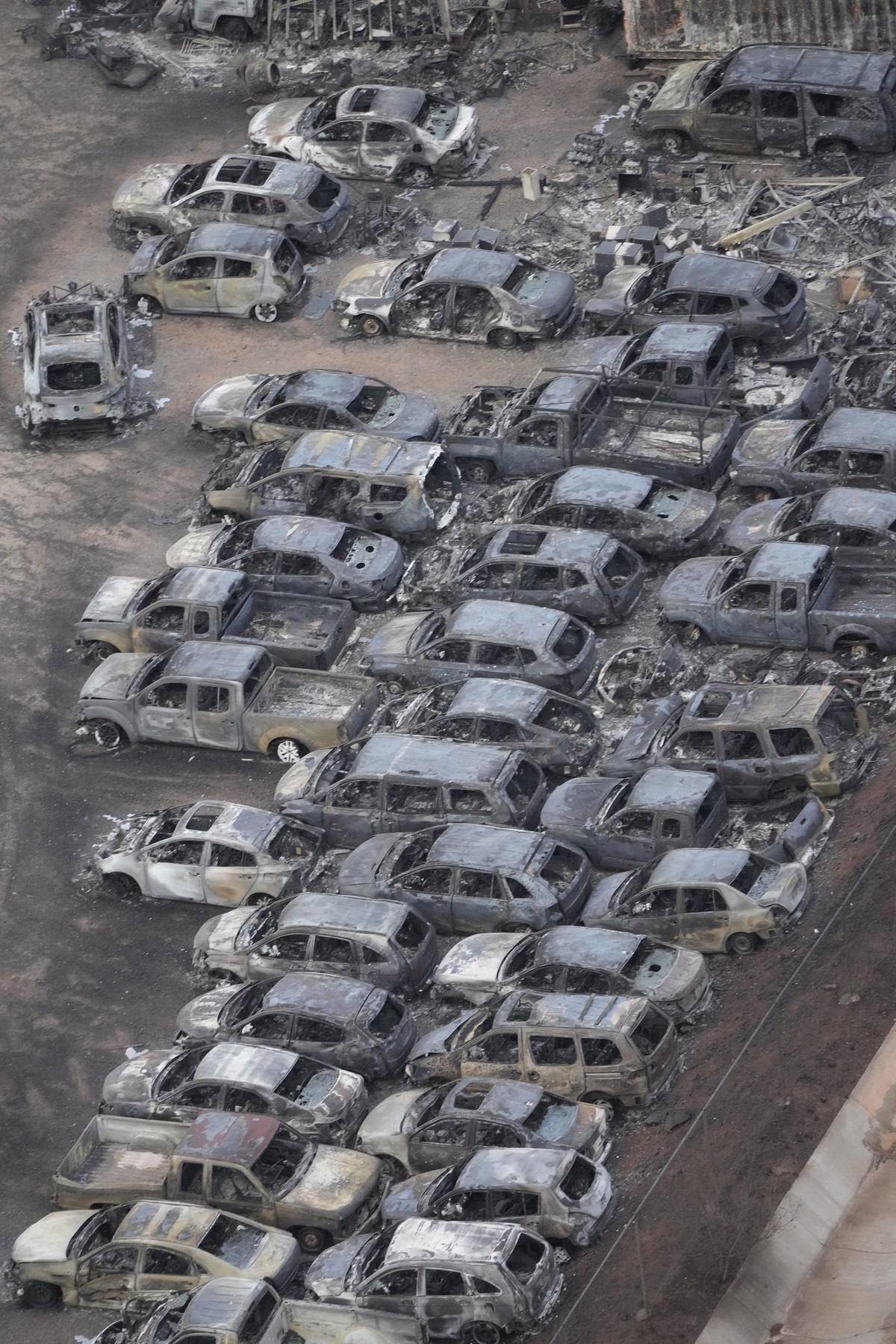 Wildfire wreckage is shown Thursday, Aug. 10, 2023, in Lahaina, Hawaii. The search of the wildfire wreckage on the Hawaiian island of Maui on Thursday revealed a wasteland of burned out homes and obli ...