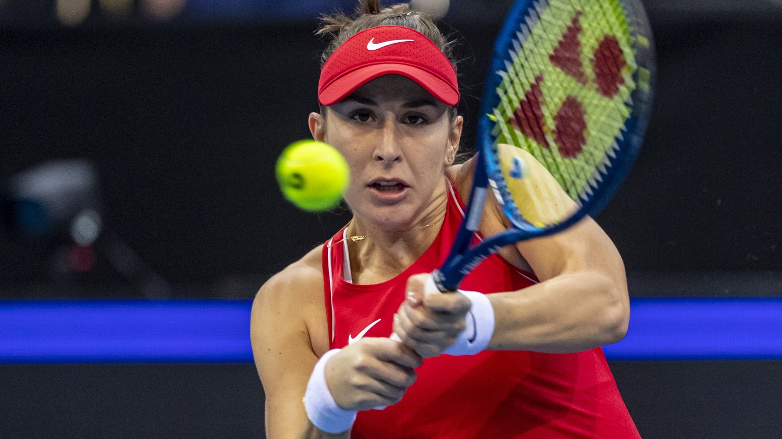 epa09568446 Belinda Bencic of Switzerland in action against Liudmila Samsonova of Russia during their final tennis match at the Billie Jean King Trophy 2021 Finals in Prague, Czech Republic, 06 Novemb ...