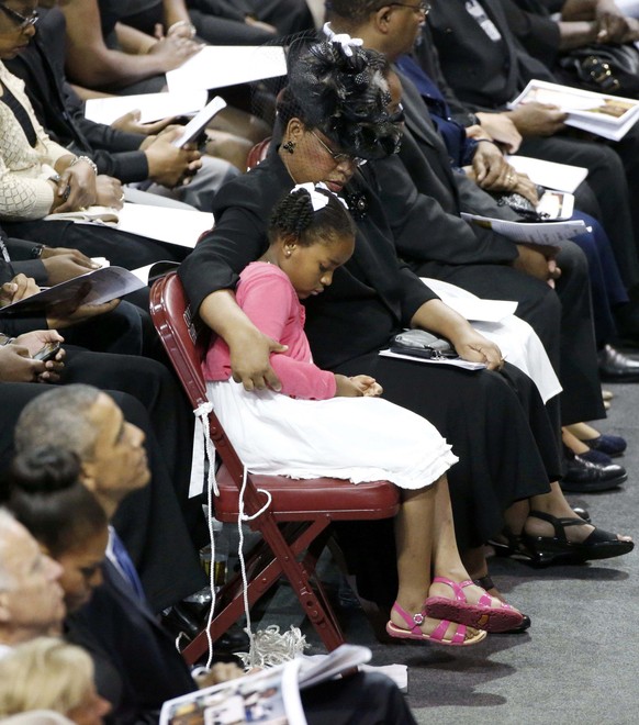 Die Familien Obama und Pinckney in der Kirche.