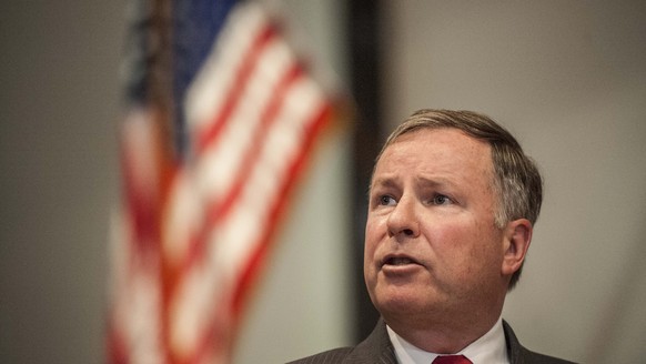 FILE - In this June 16, 2014 file photo, incumbent U.S. Rep. Doug Lamborn, (R-Colo.), speaks during the GOP congressional debate at Centennial Hall in Colorado Springs, Colo. A Lamborn spokesman said  ...