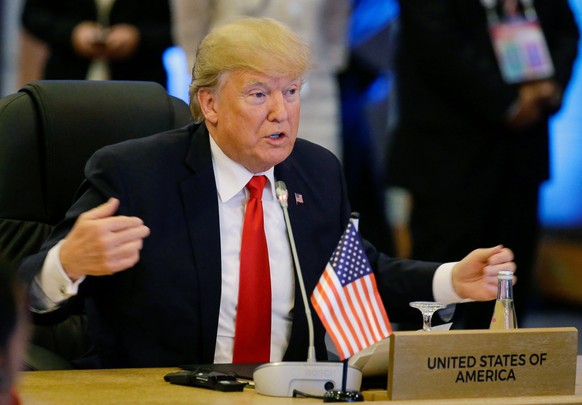 epa06326037 US President Donald J. Trump gestures while speaking during the ASEAN-US 40th Anniversary Commemorative Summit in Manila, Philippines,13 November 2017. The Philippines is hosting the 31st  ...