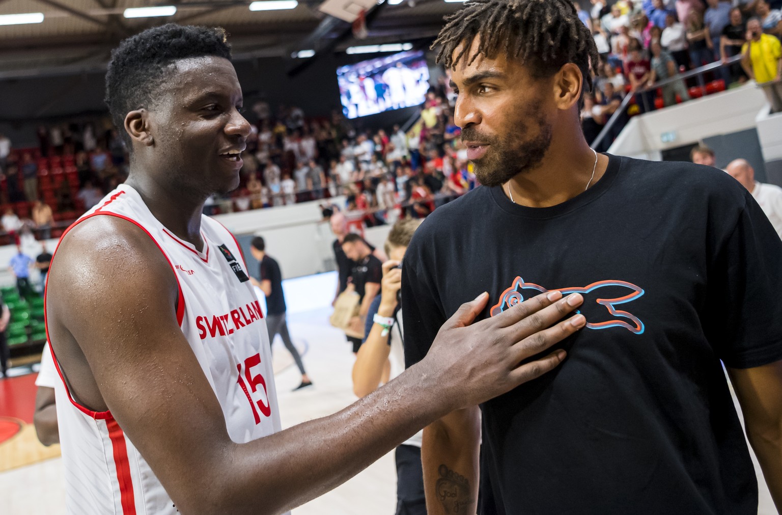 Switzerland&#039;s Clint Capela, left, reacts next to Switzerland&#039;s Thabo Sefolosha, right, during the FIBA Eurobasket 2021 pre-qualifiers match between Switzerland and Iceland in Montreux, Switz ...