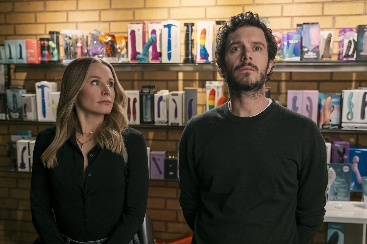 This image released by Netflix shows Kristen Bell, left, and Adam Brody in a scene from "Nobody Wants This." (Adam Rose/Netflix via AP)