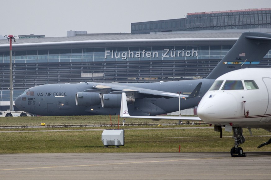 A Boeing C-17 Globmaster of the United States Air Force on its way to the head of runway 16 at Zurich Airport, in Zurich, Switzerland, on Sunday, January 14, 2018. US president Donald Trump will visit ...