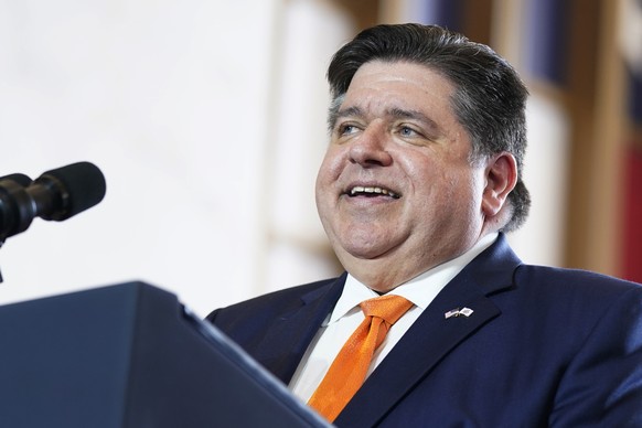 FILE - Illinois Gov. J.B. Pritzker addresses the crowd on June 28, 2023, at the Old Post Office in Chicago. Members of a legislative review panel agree that Gov. J.B. Pritzker&#039;s proposal to repla ...