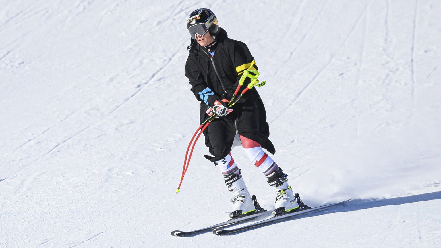 epa09637781 Lara Gut-Behrami of Switzerland arrives in the finish area during the women&#039;s Super-G race at the FIS Alpine Skiing World Cup event in St. Moritz, Switzerland, 12 December 2021. EPA/P ...