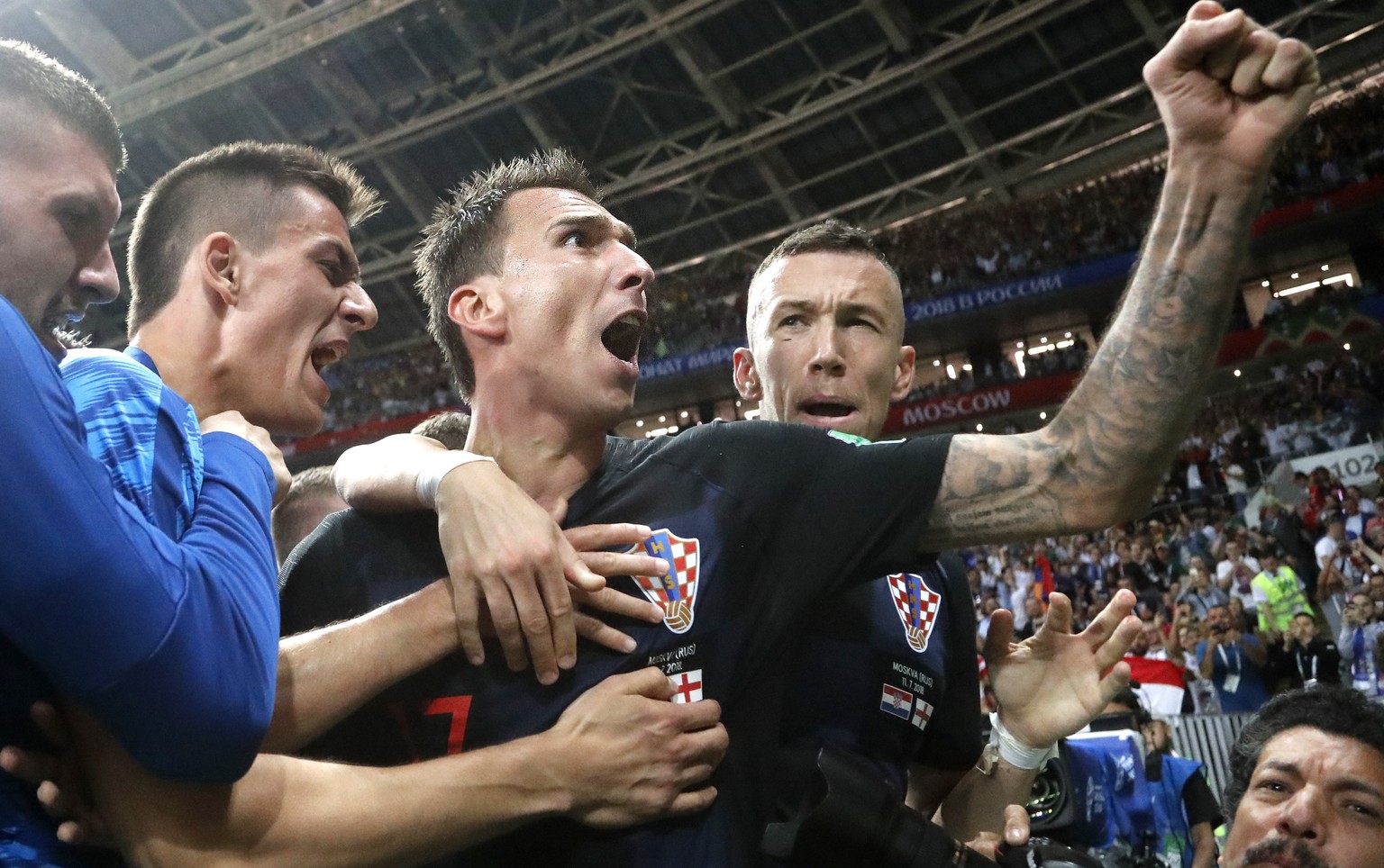 Croatia&#039;s Mario Mandzukic, center, celebrates after scoring his side&#039;s second goal during the semifinal match between Croatia and England at the 2018 soccer World Cup in the Luzhniki Stadium ...
