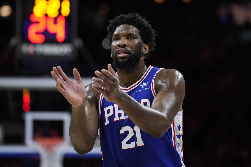 Philadelphia 76ers'  Joel Embiid reacts during the first half of Game 6 of the team's NBA playoffs in the Eastern Conference semifinals against the Boston Celtics, Thursday, May 11, 2023,...