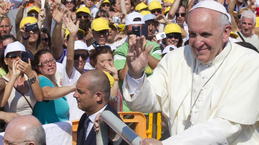 Pope Francis arrives to celebrate a Mass during his visit to the island of Lampedusa, southern Italy, Monday July 8, 2013. Pope Francis traveled Monday to the tiny Sicilian island of Lampedusa to pray ...