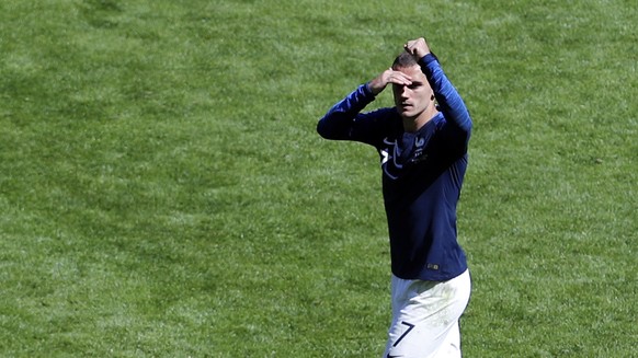 France&#039;s Antoine Griezmann celebrates after scoring his side&#039;s opening goal from penalty during the group C match between France and Australia at the 2018 soccer World Cup in the Kazan Arena ...