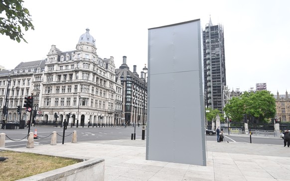 epa08480725 The boarded up Churchill Statue in London, Britain, 12 June 2020. London&#039;s Mayor, Sadiq Khan, said the capital&#039;s landmarks would be reviewed by a commission to removing those wit ...