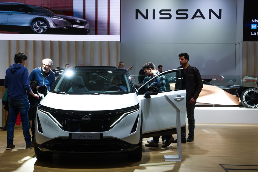 epa10403475 An Ariya of Japanese automobile manufacturer of Nissan during the inauguration of the Brussels Motor Show 2023, in Brussels, Belgium, 13 January 2023. The 100th edition of the Autosalon at ...