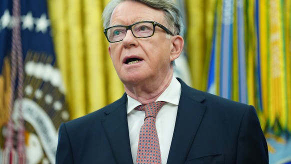 epa12084103 British Ambassador to the United States Peter Mandelson listens as US President Donald Trump (not pictured) announces a trade agreement between the United States and the United Kingdom in  ...