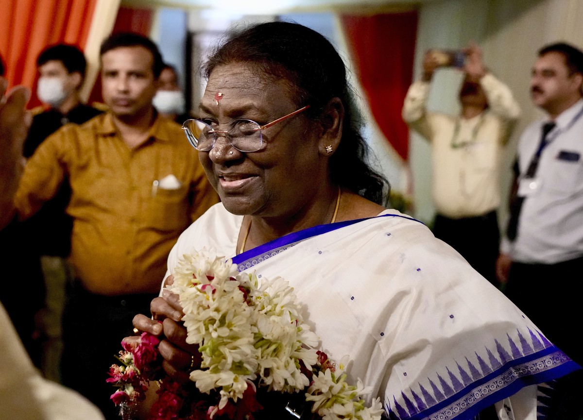 India's newly elected president Droupadi Murmu greets the crowd gathered at her temporary residence in New Delhi, India, Thursday, July 21, 2022. Murmu, a leader from India's ruling Bharatiy ...