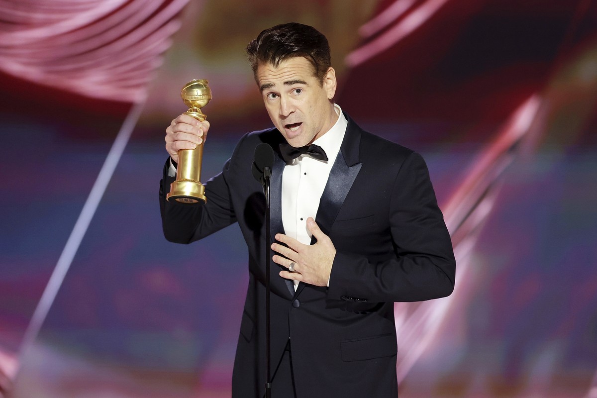 This image released by NBC shows Colin Farrell accepting the Best Actor in a Motion Picture ? Musical or Comedy award for "The Banshees of Inisherin" during the 80th Annual Golden Globe Awar ...