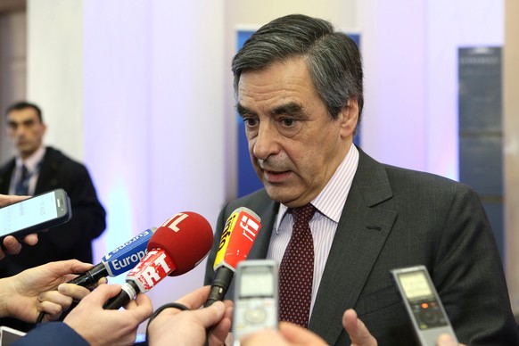 Francois Fillon, member of Les Republicains political party and 2017 presidential candidate of the French centre-right talks to reporters at the end of a meeting of the European People Party in Brusse ...