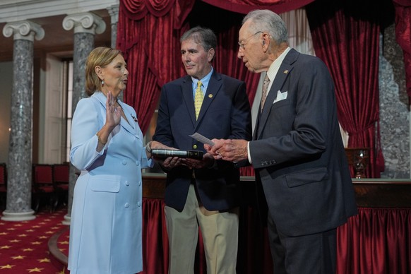 Darline Graham, sister of Sen. Lindsey Graham, R-S.C., is ceremonially sworn-in by President Pro Tempore of the Senate, Chuck Grassley, R-Iowa, in the Old Senate Chamber at the Capitol in Washington,  ...
