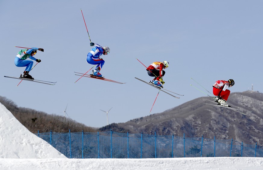epa06548651 (L-R) Siegmar Klotz of Italy, Francois Place of France, Christopher Delbosco of Canada and Sergey Ridzik of Olympic Athletes of Russia in action during the men&#039;s Freestyle Skiing Ski  ...