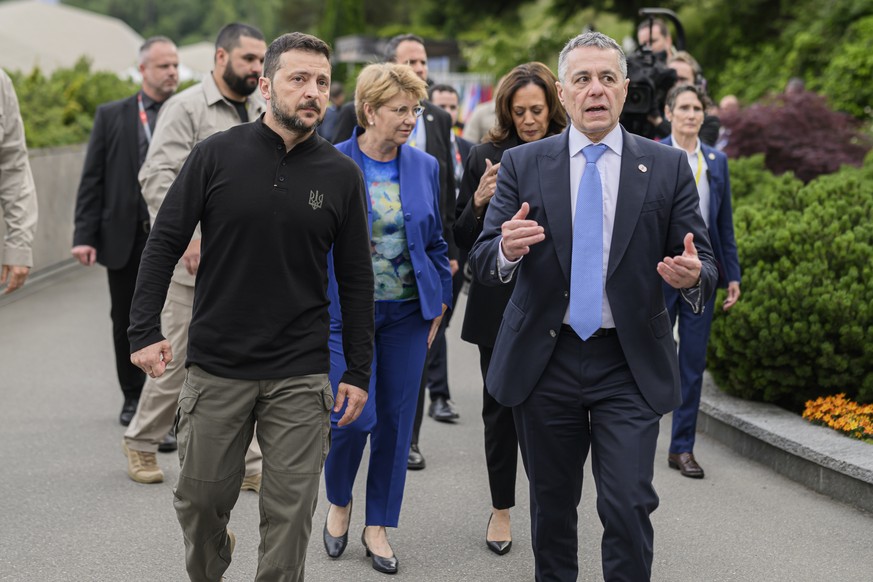 epa11413478 President Volodymyr Zelenskyy of Ukraine (L) walks next to Swiss Federal Councilor Ignazio Cassis (R) as Swiss Federal President Viola Amherd (back L) and US Vice President Kamala Harris ( ...