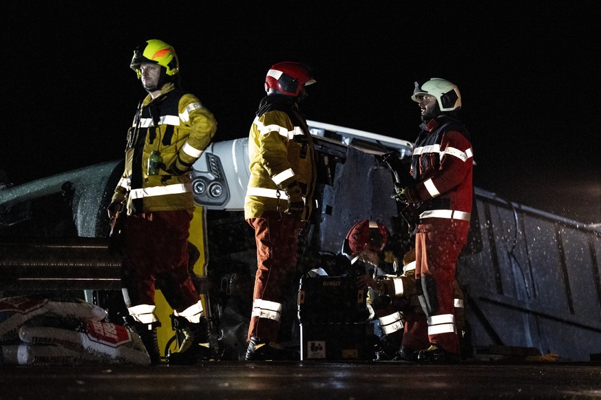 epa13230156 Emergency responders work at the scene of an accident involving a Dutch travel coach near Susch in the canton of Grisons, Switzerland, 11 September 2026. Several people died and others wer ...
