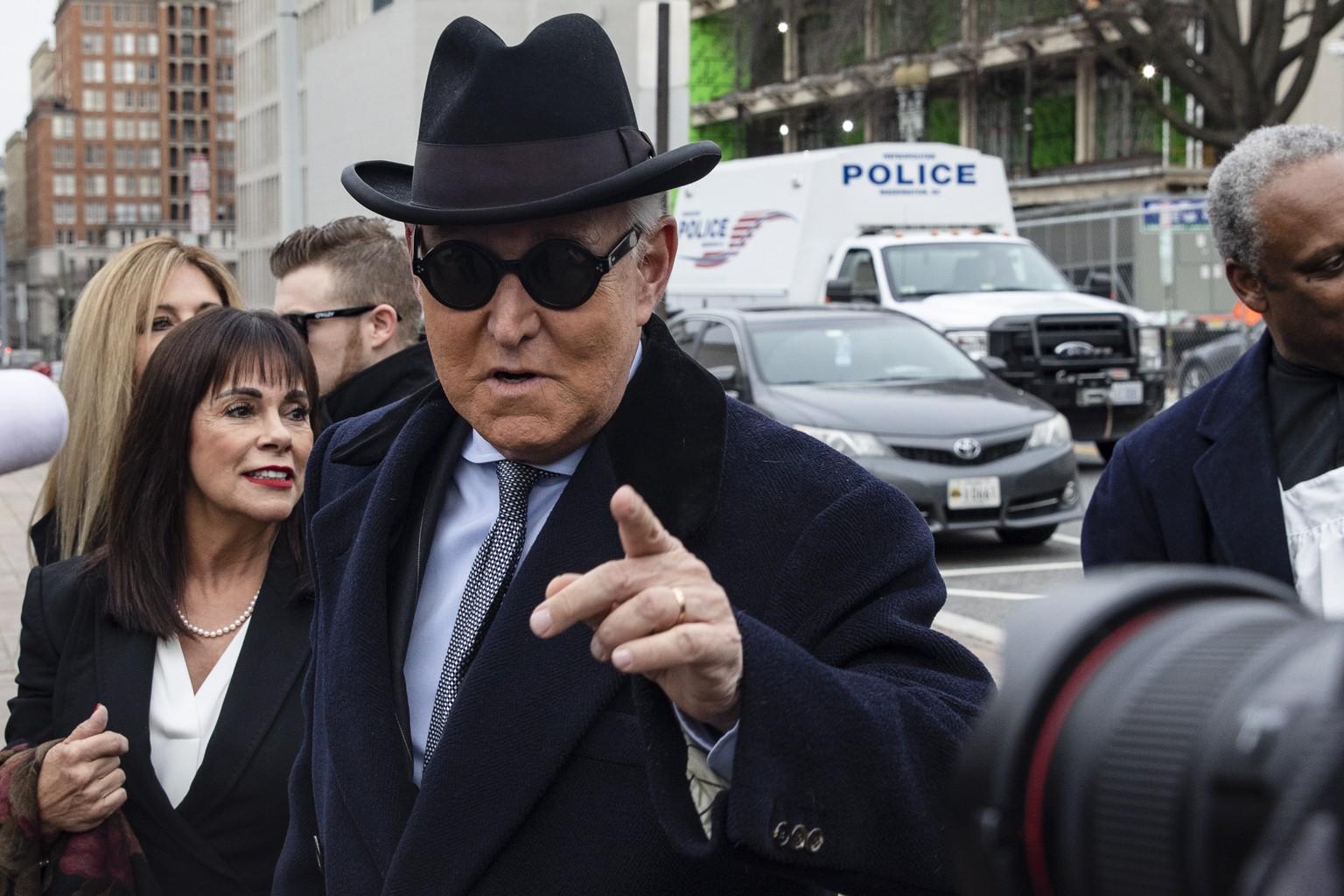 epa08539710 (FILE) - Roger Stone, a longtime political advisor to US President Donald J. Trump (C) arrives together with his wife Nydia (L) for his sentencing hearing at the DC Federal District Court  ...