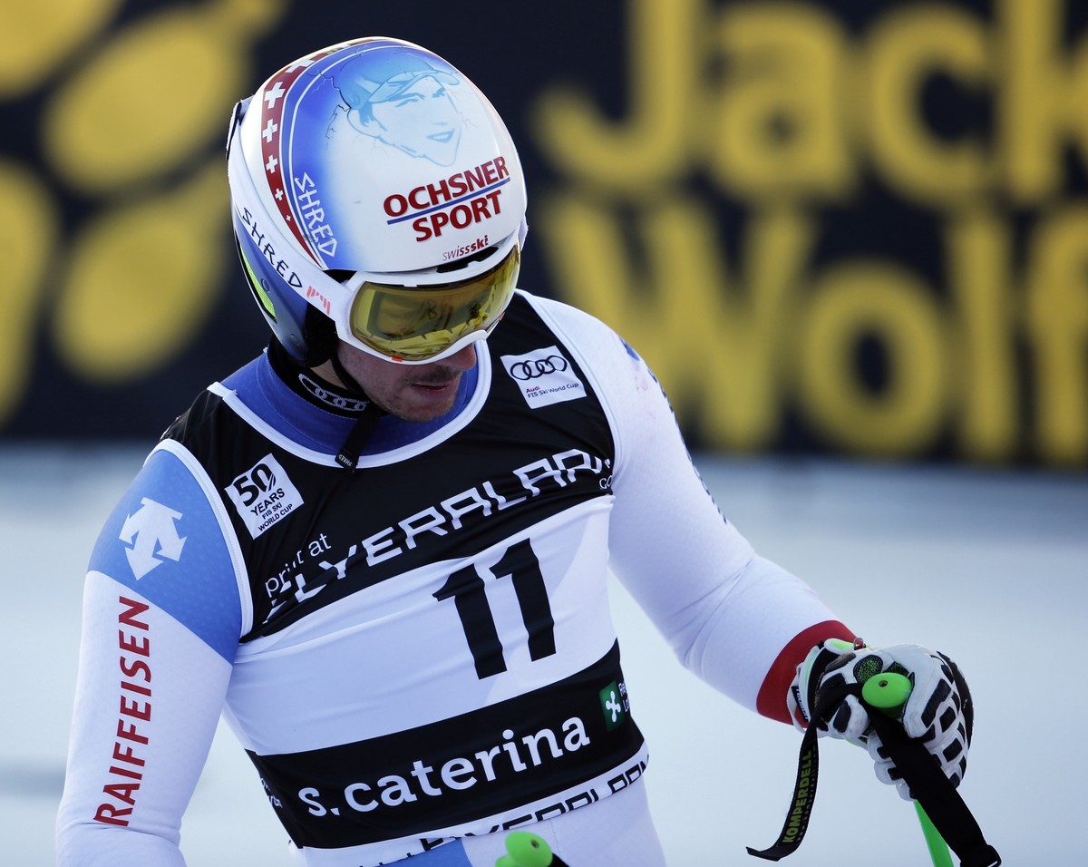 Switzerland's Carlo Janka reacts at the finish area during an alpine ski, men's World Cup Super G, in Santa Caterina, Italy, Tuesday, Dec. 27, 2016. (AP Photo/Marco Trovati)
