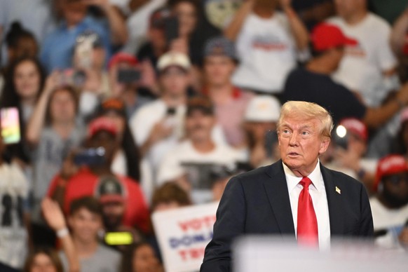 epa11523813 Republican presidential candidate Donald J. Trump attends a campaign rally at the Georgia State Convocation Center in Atlanta, Georgia, USA, 03 August 2024. EPA/EDWARD M. PIO RODA