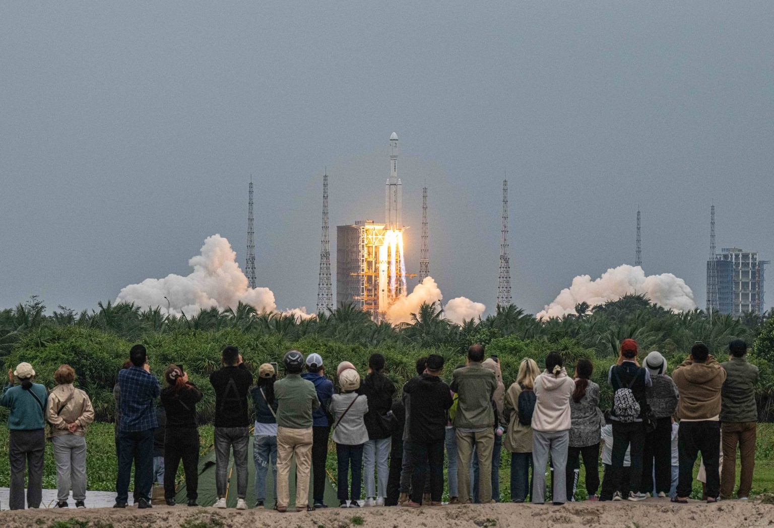 240321 -- BEIJING, March 21, 2024 -- A Long March-8 rocket, carrying the relay satellite Queqiao-2 for Earth-Moon communications, blasts off at the Wenchang Space Launch Center in south China s Hainan ...